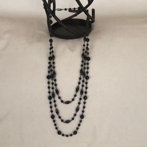 BLACK BEADED TRIPLE STRAND NECKLACE